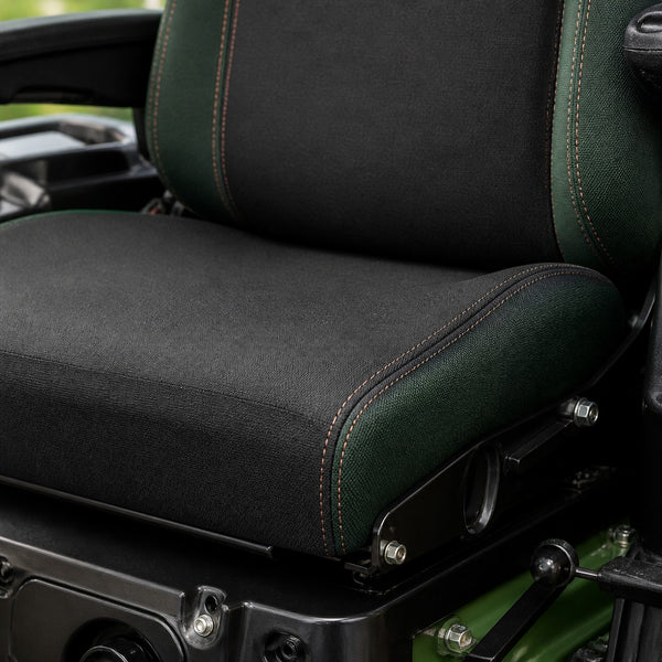 Bear Shield seat cover concept on a representative ag turf seat, construction detail (AI-generated depiction)
