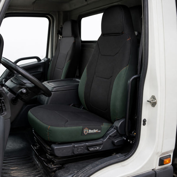 Bear Armor seat cover concept on a representative heavy truck seat, installed in cab (AI-generated depiction)