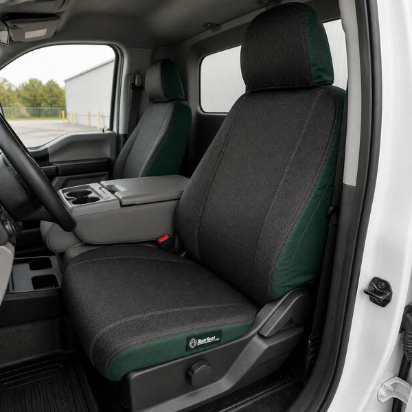 Bear Shield seat cover concept on a representative heavy truck seat, installed in cab (AI-generated depiction)