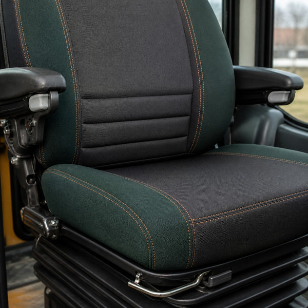 Bear Shield seat cover concept on a representative tractor seat, construction detail (AI-generated depiction)