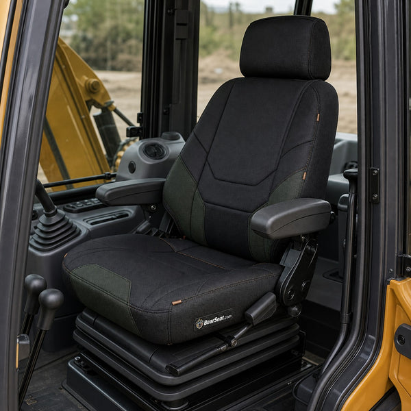 Bear Armor seat cover concept on a representative backhoe seat, installed in cab (AI-generated depiction)