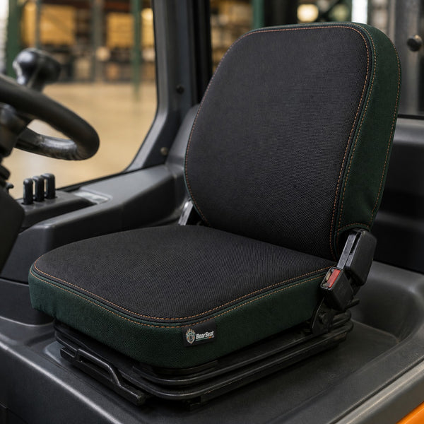Bear Shield seat cover concept on a representative forklift seat, installed in cab (AI-generated depiction)