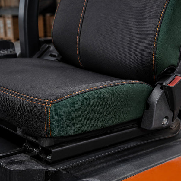 Bear Shield seat cover concept on a representative forklift seat, construction detail (AI-generated depiction)