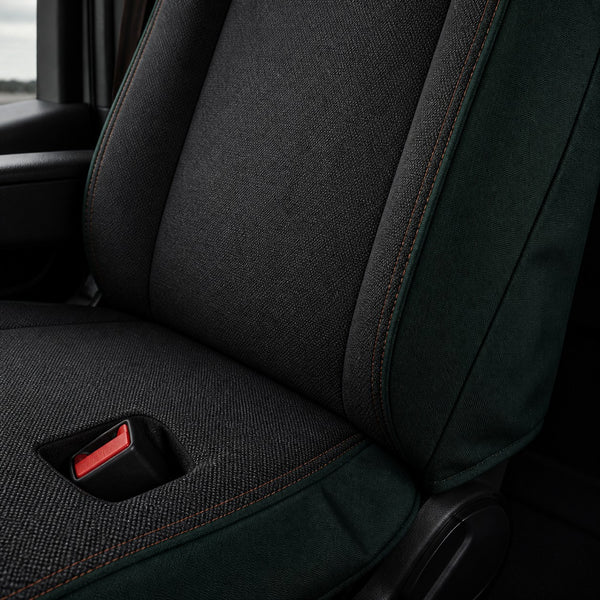 Bear Shield seat cover concept on a representative heavy truck seat, construction detail (AI-generated depiction)