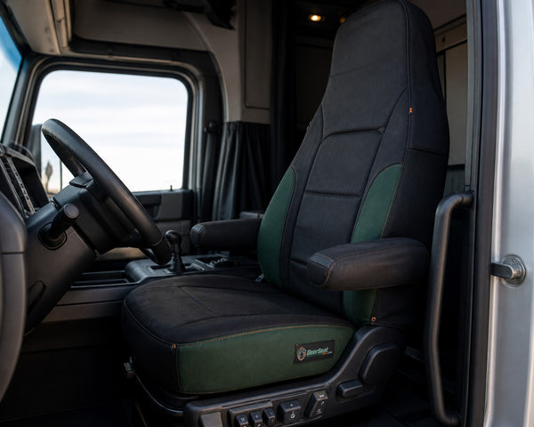 Bear Armor seat cover concept on a representative semi seat, installed in cab (AI-generated depiction)